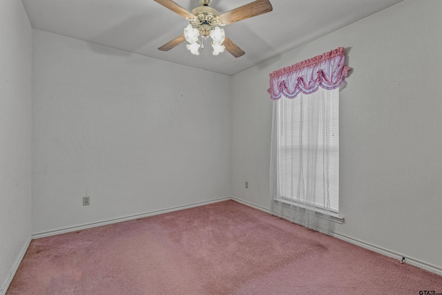 unfurnished room featuring light carpet and ceiling fan