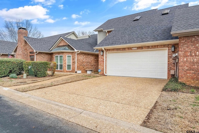 7117 Holly Square Ct, Tyler, TX 75703 - view of front of home featuring a shingled roof, brick siding, driveway, and a garage