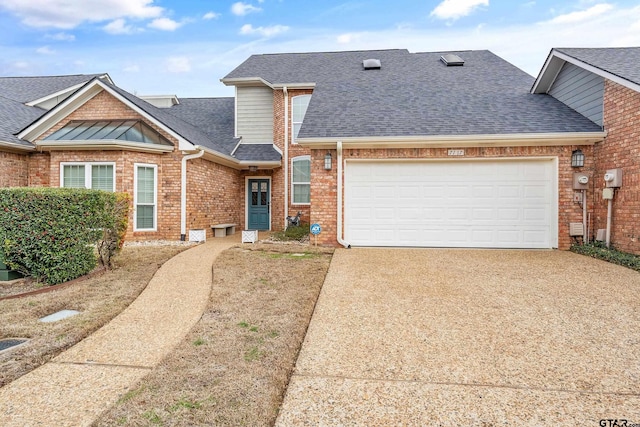 7117 Holly Square Ct, Tyler, TX 75703 - view of front of property featuring roof with shingles, brick siding, driveway, and a garage