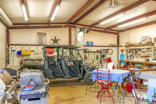 garage with a workshop area