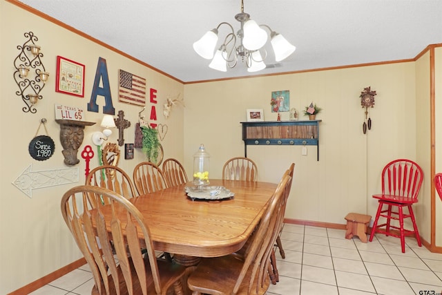 dining room with a chandelier, crown molding, and light tile patterned floors