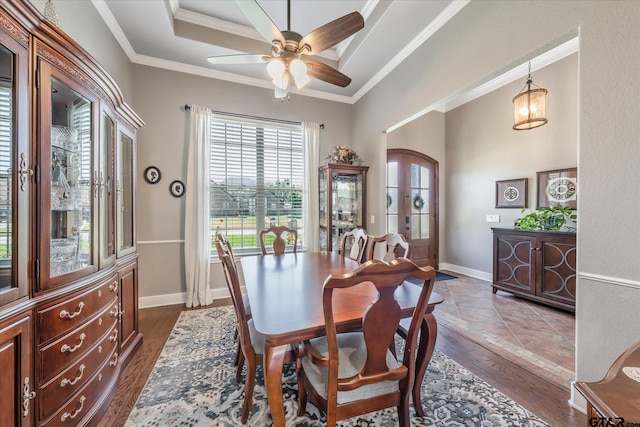 301 Zambezi Ln, Bullard, TX 75757 - dining room featuring dark wood finished floors, ornamental molding, a ceiling fan, baseboards, and french doors