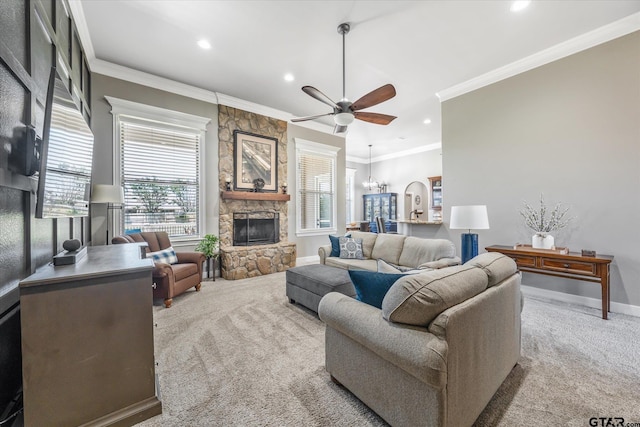 301 Zambezi Ln, Bullard, TX 75757 - carpeted living area featuring a ceiling fan, a stone fireplace, plenty of natural light, recessed lighting, and crown molding