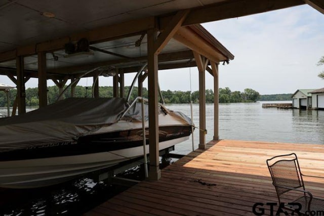 dock area featuring a water view