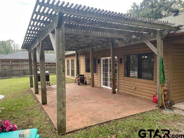 view of patio featuring area for grilling and a pergola