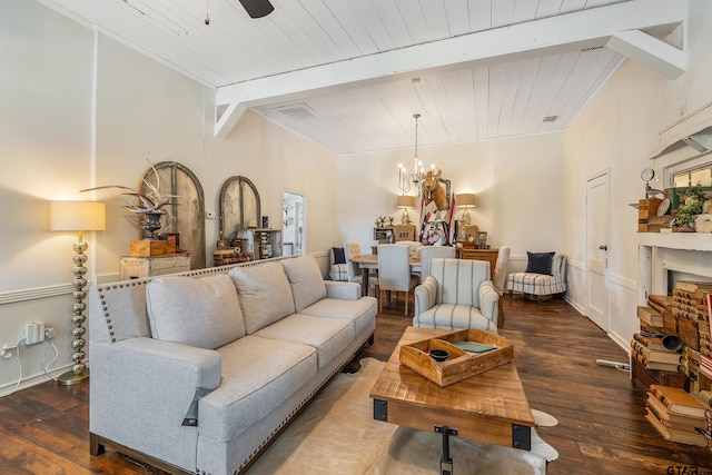 living room featuring wood ceiling, dark hardwood / wood-style floors, a chandelier, and beam ceiling