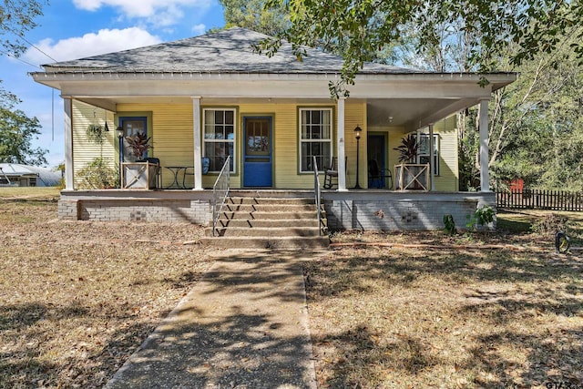 view of front of property featuring covered porch