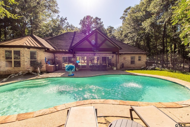 view of pool with a patio area