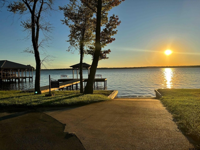 dock area featuring a water view