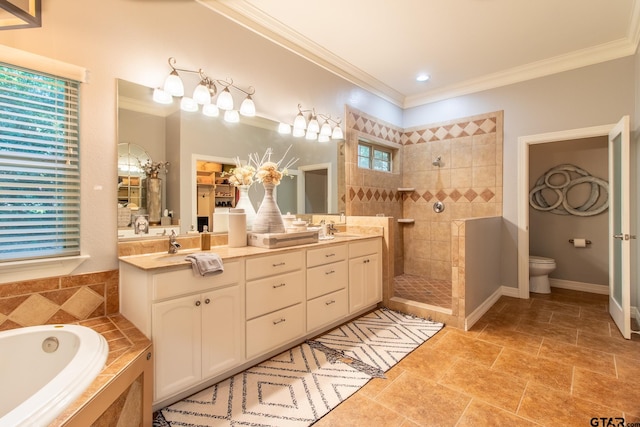 full bathroom with vanity, independent shower and bath, a healthy amount of sunlight, and ornamental molding