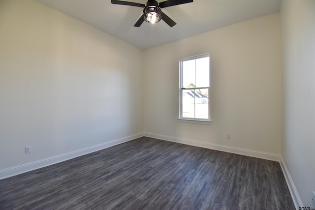 unfurnished room with ceiling fan and dark wood-type flooring