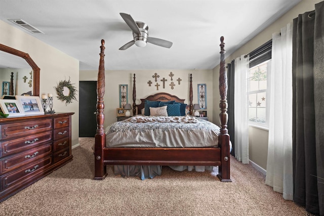 carpeted bedroom with ceiling fan