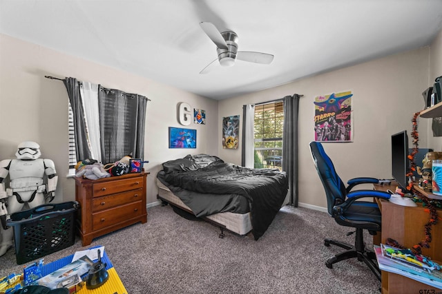 carpeted bedroom with ceiling fan