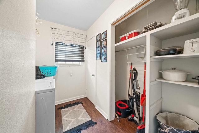 mudroom with dark hardwood / wood-style flooring and washer / clothes dryer