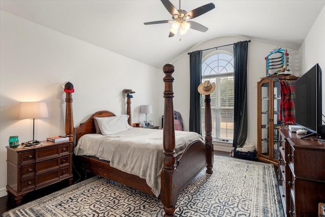 bedroom with light wood-type flooring, lofted ceiling, and ceiling fan