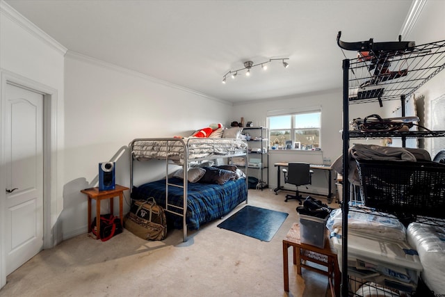 carpeted bedroom featuring crown molding