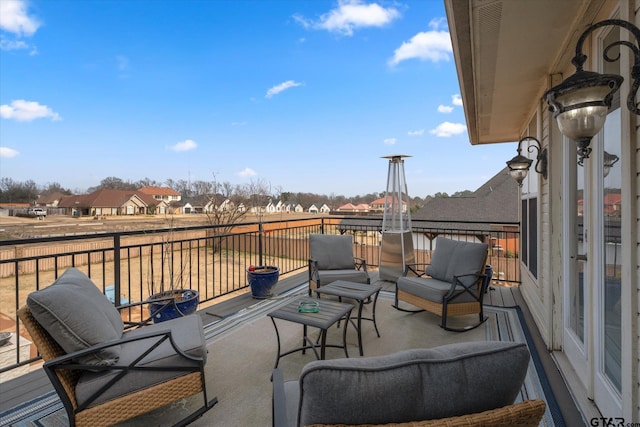 view of patio featuring a balcony