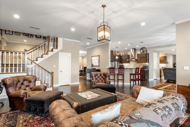 living room featuring crown molding and dark hardwood / wood-style flooring