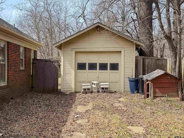 detached garage with fence