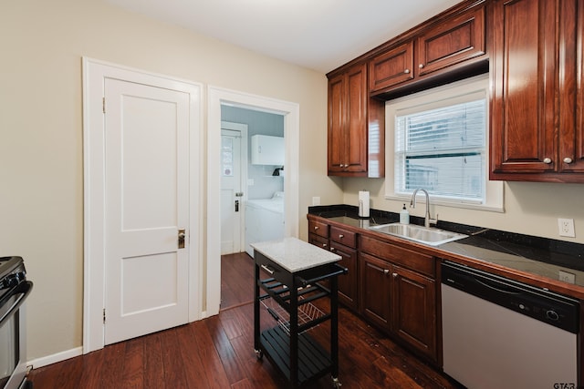 kitchen featuring dark wood-style flooring, a sink, stove, dishwasher, and dark countertops