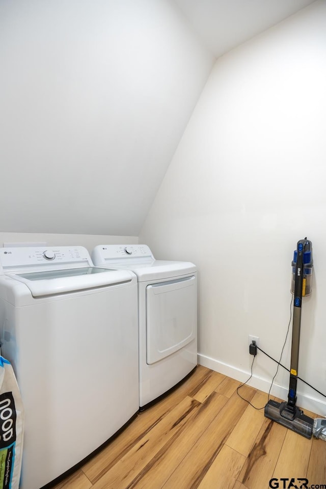15683 Crk 472, Tyler, TX 75706 - laundry room with washing machine and dryer and light wood-style floors