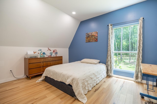 15683 Crk 472, Tyler, TX 75706 - bedroom with light wood-style flooring, lofted ceiling, and recessed lighting