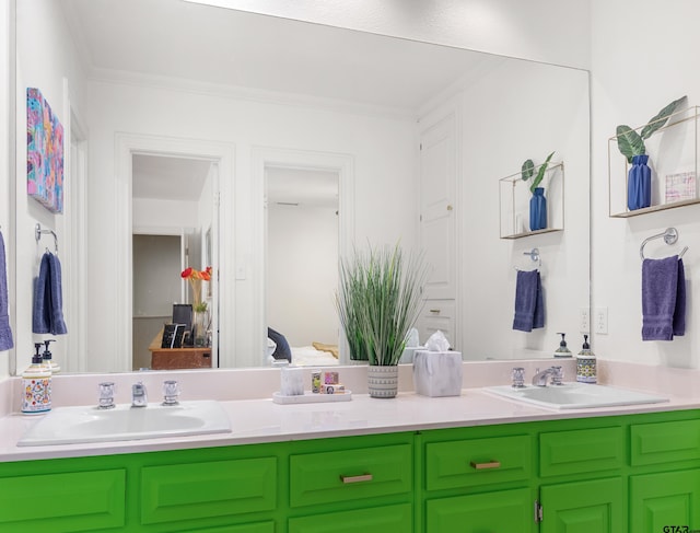 bathroom with vanity and ornamental molding