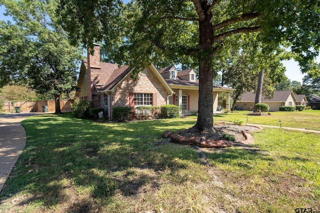 view of front of home with a front lawn