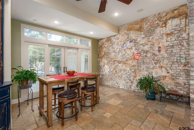 dining area featuring french doors and ceiling fan