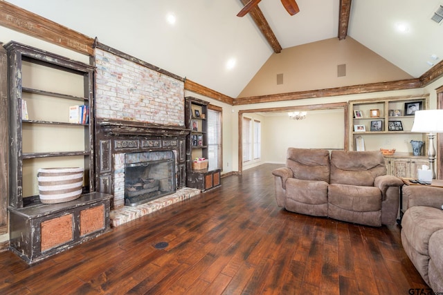 living room featuring lofted ceiling with beams, dark hardwood / wood-style flooring, ceiling fan, and a fireplace