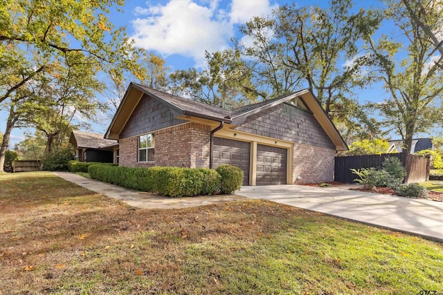 view of property exterior with a yard and a garage