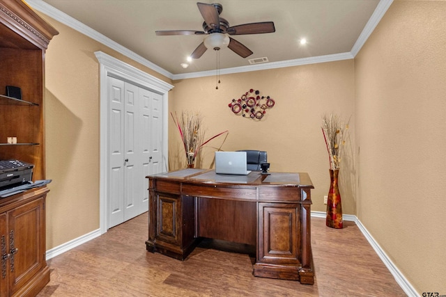 office space with ceiling fan, light wood-type flooring, and crown molding