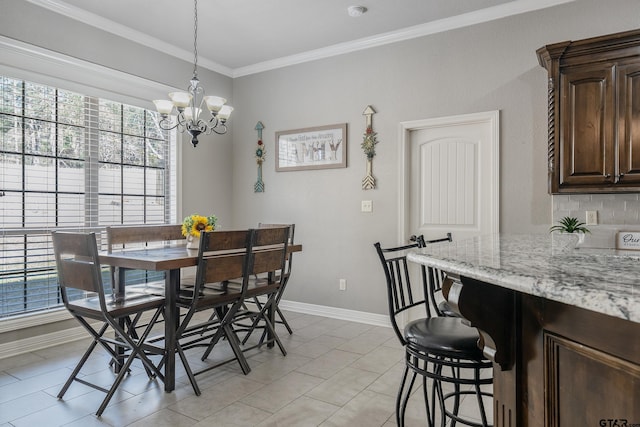 dining room with crown molding, light tile patterned flooring, plenty of natural light, and a notable chandelier