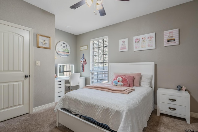 bedroom with ceiling fan and carpet floors