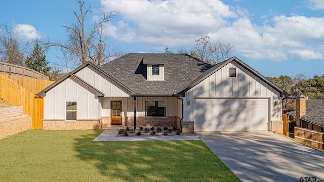 view of front of property with board and batten siding, brick siding, a garage, and fence