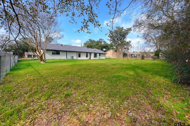 view of yard with fence