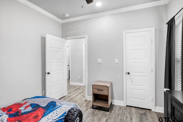 2609 Tulsa St, Tyler, TX 75702 - bedroom with ornamental molding, wood finished floors, and ceiling fan