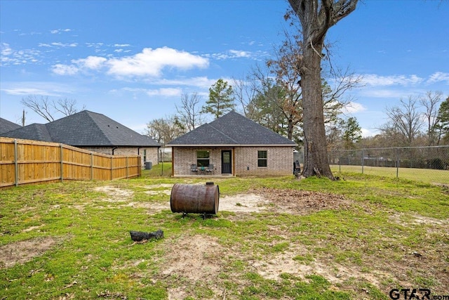 2609 Tulsa St, Tyler, TX 75702 - back of house featuring heating fuel