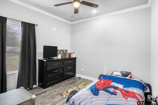 2609 Tulsa St, Tyler, TX 75702 - bedroom featuring light wood-type flooring, crown molding, and a ceiling fan