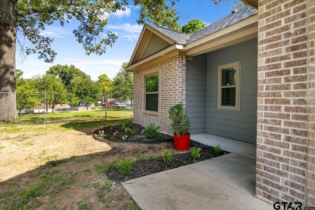 2609 Tulsa St, Tyler, TX 75702 - view of home's exterior featuring brick siding