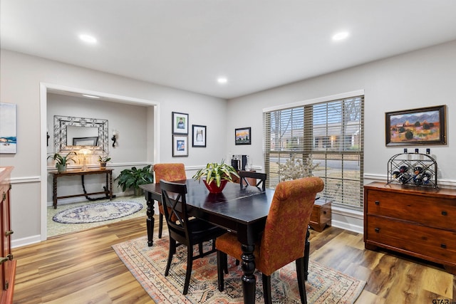 dining space featuring hardwood / wood-style flooring