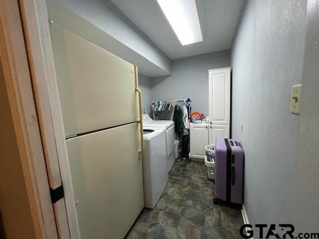 washroom featuring independent washer and dryer