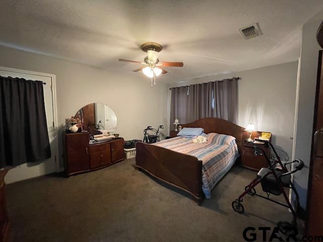 bedroom with carpet flooring and ceiling fan