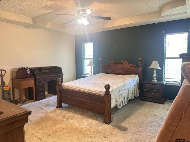 2203 S Williams Ave, Mount Pleasant, TX 75455 - bedroom featuring ceiling fan, carpet flooring, and a textured ceiling