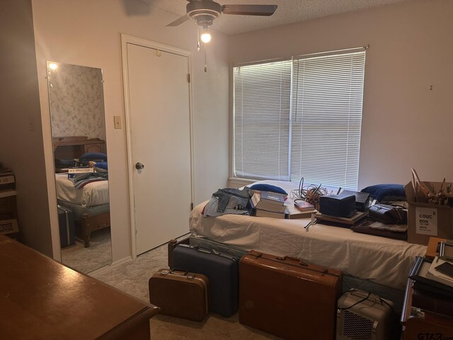 2203 S Williams Ave, Mount Pleasant, TX 75455 - bedroom featuring light colored carpet and ceiling fan