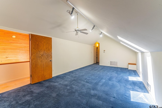 bonus room featuring a ceiling fan, lofted ceiling, visible vents, and carpet floors