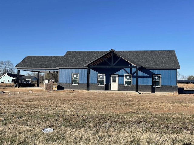 view of front of home with a front yard