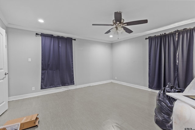 empty room with ceiling fan and ornamental molding