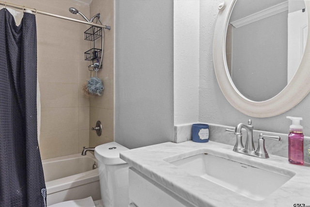 full bathroom featuring vanity, toilet, and shower / tub combo with curtain