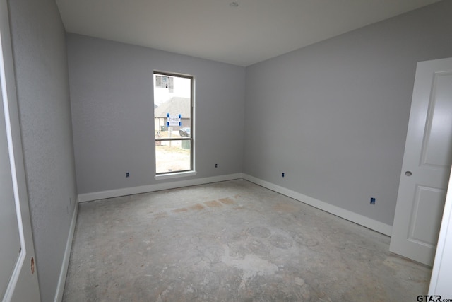 11941 Gillian Ct, Tyler, TX 75703 - unfurnished room featuring baseboards and unfinished concrete flooring
